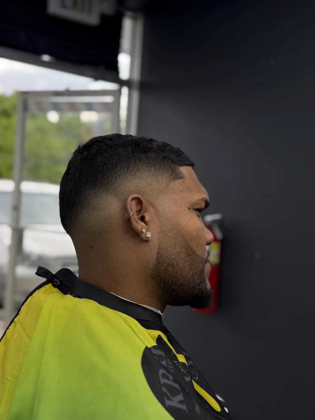 Low fade with sharp beard line